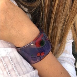 Cuff in blues and red.